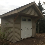 Oak Creek gable with cedar brackets supporting roof